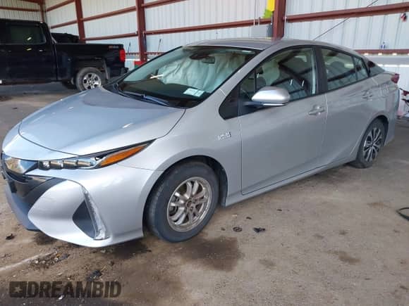 2021 Toyota Prius Limited z VIN JTDKAMFP9M3187986, wystawiony jako IAAI lot #43398563 z przebiegiem 38 772 mil mil oraz . Historia ofert i sprzedaży dostępna na DreamBid. Obrazek 2.
