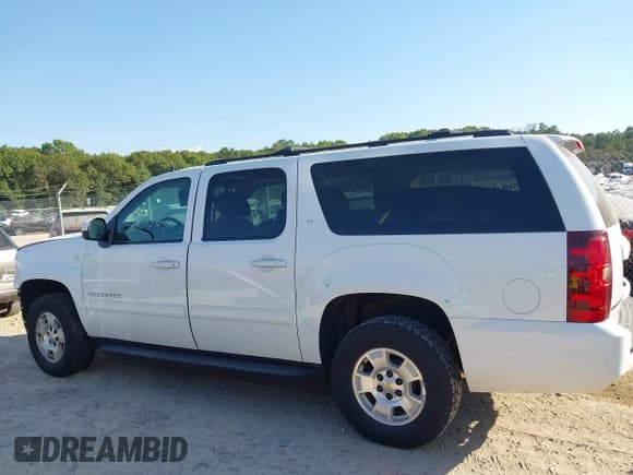 ✅ 2014 Chevrolet Suburban LT • VIN: 1GNSKJE7XER207987 • Lot: 43375552. Listed on IAAI with 146,389 mi. Free auction sales archive from the USA and detailed vehicle history report at DreamBid. Image 14.