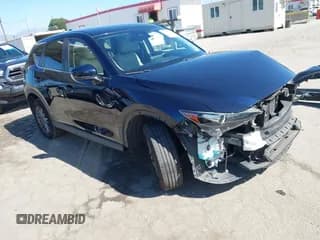 ✅ 2017 Mazda CX-5 Touring • VIN: JM3KFACL6H0164228 • Lot: 43512056. Wystawiony na IAAI z przebiegiem 81 314 mil. Bezpłatny archiwum sprzedaży aukcyjnych z USA i szczegółowy raport historii pojazdu na DreamBid. Zdjęcie 1.