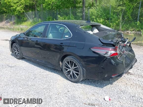 2023 Toyota Camry SE z VIN 4T1G11BKXPU101092, wystawiony jako IAAI lot #42396141 z przebiegiem 22 174 mil mil oraz . Historia ofert i sprzedaży dostępna na DreamBid. Obrazek 3.