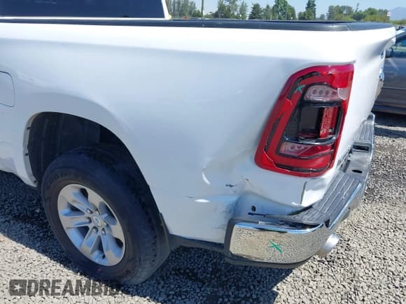 ✅ 2024 Ram 1500 Laramie • VIN: 1C6RREJT3RN220985 • Lot: 42773509. Listed on IAAI with 28,839 mi. Free auction sales archive from the USA and detailed vehicle history report at DreamBid. Image 6.