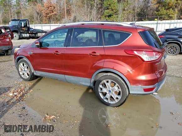 ✅ 2015 Ford Escape Titanium • VIN: 1FMCU0JX0FUA50956 • Lot: 94133575. Listed on Copart with 106,503 mi. Free auction sales archive from the USA and detailed vehicle history report at DreamBid. Image 2.
