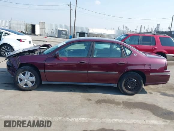 ✅ 2004 Chevrolet Impala • VIN: 2G1WF52E849397525 • Lot: 42903583. Listed on IAAI with 152,465 mi. Free auction sales archive from the USA and detailed vehicle history report at DreamBid. Image 14.