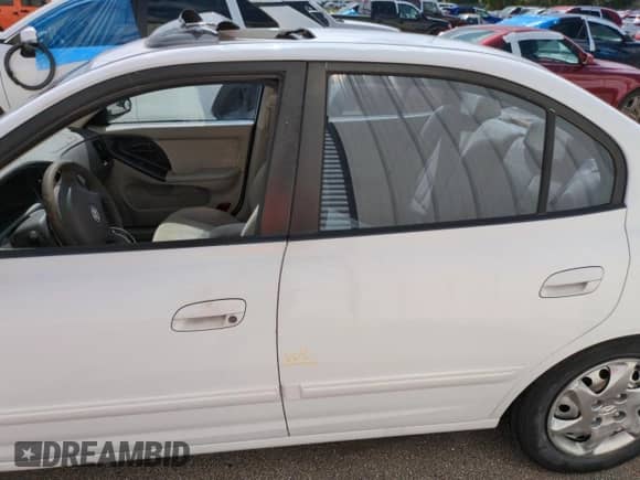 2005 Hyundai Elantra GLS с VIN KMHDN46D95U125448, выставлен на аукционе Copart как лот 75404274 с пробегом Не указан миль и Списание • Salvage title. История ставок и продаж доступна на DreamBid. Изображение 12.