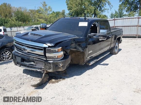 ✅ 2018 Chevrolet Silverado 2500HD High Country • VIN: 1GC1KXEY2JF276409 • Lot: 43179213. Listed on IAAI with 122,005 mi. Free auction sales archive from the USA and detailed vehicle history report at DreamBid. Image 18.