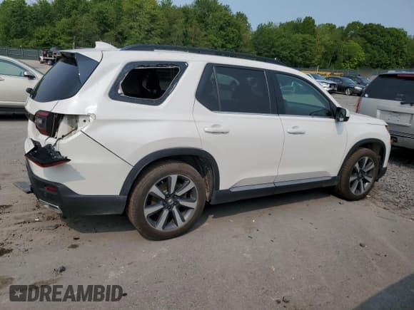 ✅ 2023 Honda Pilot Touring • VIN: 5FNYG1H71PB053906 • Lot: 59125925. Listed on Copart with 47,101 mi. Free auction sales archive from the USA and detailed vehicle history report at DreamBid. Image 3.