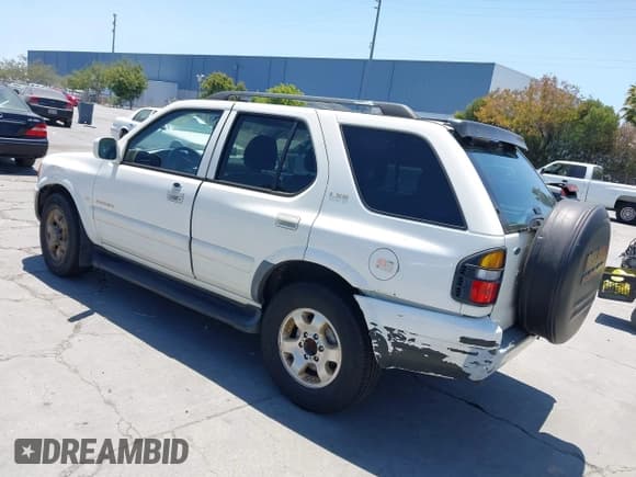✅ 1999 Isuzu Rodeo S • VIN: 4S2CK58W1X4344442 • Lot: 42519582. Listed on IAAI with 185,098 mi. Free auction sales archive from the USA and detailed vehicle history report at DreamBid. Image 3.