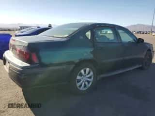 2002 Chevrolet Impala with VIN 2G1WF52E929135512, listed as a Copart auction lot 82635445 with 213,598 mi miles and Salvage title. Bid and sale history available at DreamBid. Image 3.