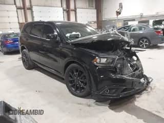 2017 Dodge Durango R/T with VIN 1C4SDJCT9HC945581, listed as a IAAI auction lot 43420044 with 143,365 mi miles and . Bid and sale history available at DreamBid. Image 1.