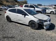 ✅ 2020 Subaru Impreza • VIN: 4S3GTAA63L1715951 • Lot: 69260055. Listed on Copart with 69,304 mi. Free auction sales archive from the USA and detailed vehicle history report at DreamBid. Image 4.