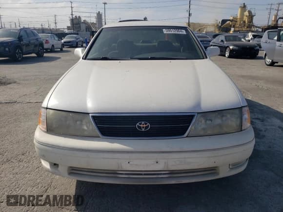 ✅ 1999 Toyota Avalon XL • VIN: 4T1BF18B9XU323397 • Лот: 77034064. Опубликован ранее на Copart с пробегом 236 026 миль. Бесплатный доступ к архиву аукционных продаж из США и подробный отчёт об истории автомобиля на DreamBid. Изображение 5.