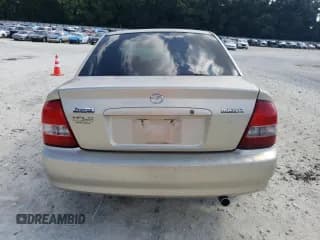 ✅ 2001 Mazda Protege DX • VIN: JM1BJ222710423952 • Lot: 72344954. Wystawiony na Copart z przebiegiem 178 099 mil. Bezpłatny archiwum sprzedaży aukcyjnych z USA i szczegółowy raport historii pojazdu na DreamBid. Zdjęcie 6.