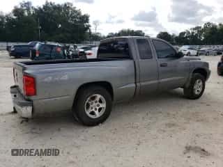2005 Dodge Dakota SLT с VIN 1D7HW42N95S290614, выставлен на аукционе Copart как лот 72079414 с пробегом 130 925 миль миль и Списание • Salvage title. История ставок и продаж доступна на DreamBid. Изображение 3.