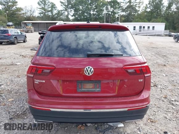 ✅ 2018 Volkswagen Tiguan SEL • VIN: 3VV3B7AX2JM027518 • Лот: 43420611. Опубликован ранее на IAAI с пробегом 64 153 миль. Бесплатный доступ к архиву аукционных продаж из США и подробный отчёт об истории автомобиля на DreamBid. Изображение 16.