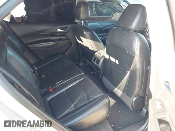 2018 Chevrolet Equinox Premier z VIN 3GNAXNEX5JS509702, wystawiony jako IAAI lot #43364923 z przebiegiem 152 731 mil mil oraz . Historia ofert i sprzedaży dostępna na DreamBid. Obrazek 8.