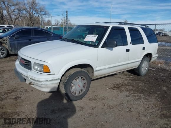 ✅ 1996 GMC Jimmy SL • VIN: 1GKDT13W8T2522192 • Lot: 41439548. Wystawiony na IAAI z przebiegiem 262 152 mil. Bezpłatny archiwum sprzedaży aukcyjnych z USA i szczegółowy raport historii pojazdu na DreamBid. Zdjęcie 2.