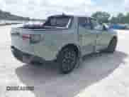 2023 Hyundai Santa Cruz SEL with VIN 5NTJCDAE5PH064434, listed as a IAAI auction lot 43363723 with 13,727 mi miles and . Bid and sale history available at DreamBid. Image 4.