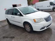✅ 2011 Chrysler Town & Country Touring L • VIN: 2A4RR8DG2BR759125 • Lot: 43131684. Listed on IAAI with 213,826 mi. Free auction sales archive from the USA and detailed vehicle history report at DreamBid. Image 1.