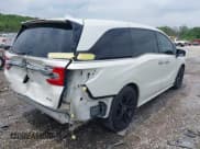 ✅ 2019 Honda Odyssey Elite • VIN: 5FNRL6H95KB104816 • Lot: 42232490. Listed on IAAI with 77,465 mi. Free auction sales archive from the USA and detailed vehicle history report at DreamBid. Image 4.