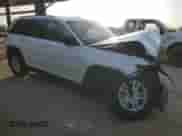 2024 Jeep Grand Cherokee Laredo X with VIN 1C4RJGAG5RC264173, listed as a Copart auction lot 45505465 with 7,633 mi miles and Salvage title. Bid and sale history available at DreamBid. Image 4.