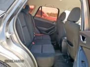 ✅ 2014 Mazda CX-5 Sport • VIN: JM3KE2BE5E0386119 • Lot: 68226855. Listed on Copart with 310,877 mi. Free auction sales archive from the USA and detailed vehicle history report at DreamBid. Image 11.