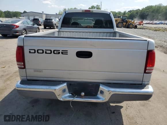 2002 Dodge Dakota SLT с VIN 1B7GL42N32S692316, выставлен на аукционе Copart как лот 55309145 с пробегом 105 653 миль миль и Списание • Salvage title. История ставок и продаж доступна на DreamBid. Изображение 6.