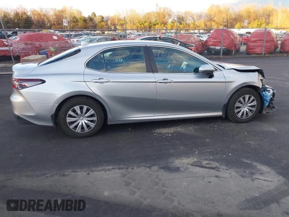 ✅ 2023 Toyota Camry Hybrid LE • VIN: 4T1C31AK6PU052323 • Lot: 43714828. Listed on IAAI with 23,606 mi. Free auction sales archive from the USA and detailed vehicle history report at DreamBid. Image 14.