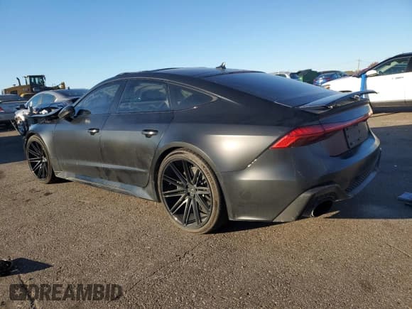 ✅ 2021 Audi RS 7 • VIN: WUAPCBF2XMN903682 • Lot: 90064965. Listed on Copart with 21,299 mi. Free auction sales archive from the USA and detailed vehicle history report at DreamBid. Image 2.