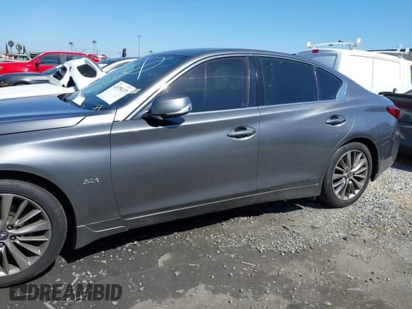 ✅ 2019 Infiniti Q50 Luxe • VIN: JN1EV7AP5KM519569 • Lot: 42078137. Listed on IAAI with 134,486 mi. Free auction sales archive from the USA and detailed vehicle history report at DreamBid. Image 14.