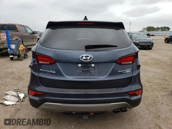✅ 2017 Hyundai Santa Fe Ultimate • VIN: 5XYZWDLA1HG473090 • Лот: 65589344. Опубликован ранее на Copart с пробегом 88 367 миль. Бесплатный доступ к архиву аукционных продаж из США и подробный отчёт об истории автомобиля на DreamBid. Изображение 6.