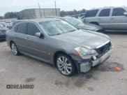 ✅ 2010 Infiniti M • VIN: JN1CY0AP2AM910957 • Lot: 41530001. Listed on IAAI with 152,849 mi. Free auction sales archive from the USA and detailed vehicle history report at DreamBid. Image 1.