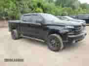 2021 Chevrolet Silverado 1500 LT Trail Boss with VIN 3GCPYFED9MG297616, listed as a Copart auction lot 60723505 with 95,175 mi miles and Salvage title. Bid and sale history available at DreamBid. Image 4.