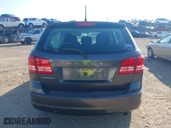 ✅ 2015 Dodge Journey American Value • VIN: 3C4PDCABXFT583466 • Лот: 43004099. Опубликован ранее на IAAI с пробегом 152 730 миль. Бесплатный доступ к архиву аукционных продаж из США и подробный отчёт об истории автомобиля на DreamBid. Изображение 14.