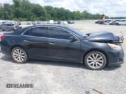 ✅ 2013 Chevrolet Malibu LTZ • VIN: 1G11H5SA6DF190026 • Lot: 42984401. Listed on IAAI with Not provided. Free auction sales archive from the USA and detailed vehicle history report at DreamBid. Image 13.