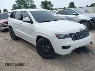 2022 Jeep Grand Cherokee Laredo E with VIN 1C4RJEAG3NC155726, listed as a IAAI auction lot 42359235 with 84,199 mi miles and . Bid and sale history available at DreamBid. Image 1.