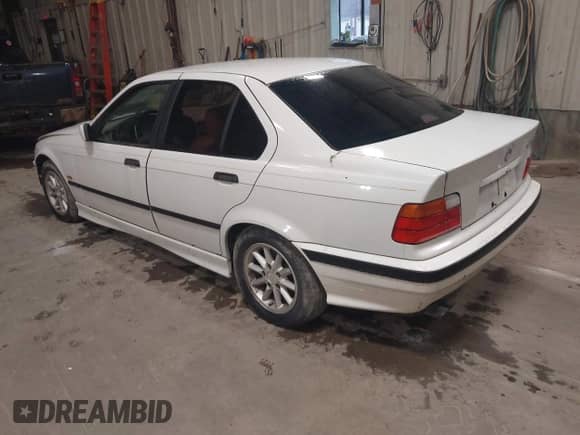1998 BMW 3 Series 328i with VIN WBACD4323WAV62223, listed as a IAAI auction lot 42217700 with 197,482 mi miles and . Bid and sale history available at DreamBid. Image 3.