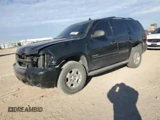 2011 Chevrolet Tahoe LS z VIN 1GNSKAE00BR295771, wystawiony jako Copart lot #85968614 z przebiegiem 142 535 mil mil oraz Szkoda całkowita • Salvage title. Historia ofert i sprzedaży dostępna na DreamBid. Obrazek 1.