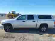 2006 Dodge Dakota SLT with VIN 1D7HE48N46S556925, listed as a IAAI auction lot 41169757 with 158,667 mi miles and . Bid and sale history available at DreamBid. Image 14.