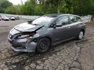 ✅ 2018 Nissan LEAF S • VIN: 1N4AZ1CP0JC303231 • Лот: 56769885. Опубликован ранее на Copart с пробегом 55 229 миль. Бесплатный доступ к архиву аукционных продаж из США и подробный отчёт об истории автомобиля на DreamBid. Изображение 1.