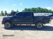 ✅ 2012 Toyota Tacoma PreRunner • VIN: 3TMJU4GN8CM136850 • Lot: 42767423. Listed on IAAI with 128,151 mi. Free auction sales archive from the USA and detailed vehicle history report at DreamBid. Image 15.