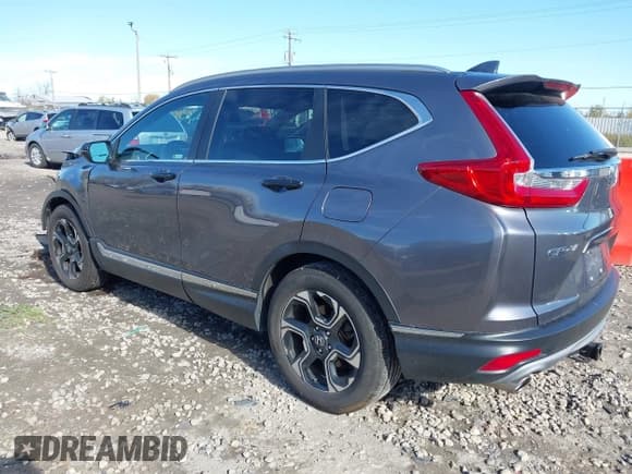 ✅ 2018 Honda CR-V Touring • VIN: 7FARW2H91JE038560 • Лот: 43492936. Опубликован ранее на IAAI с пробегом 94 898 миль. Бесплатный доступ к архиву аукционных продаж из США и подробный отчёт об истории автомобиля на DreamBid. Изображение 3.