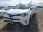 ✅ 2018 Toyota RAV4 XLE • VIN: JTMWFREVXJJ168015 • Lot: 43547840. Listed on IAAI with 104,838 mi. Free auction sales archive from the USA and detailed vehicle history report at DreamBid. Image 2.