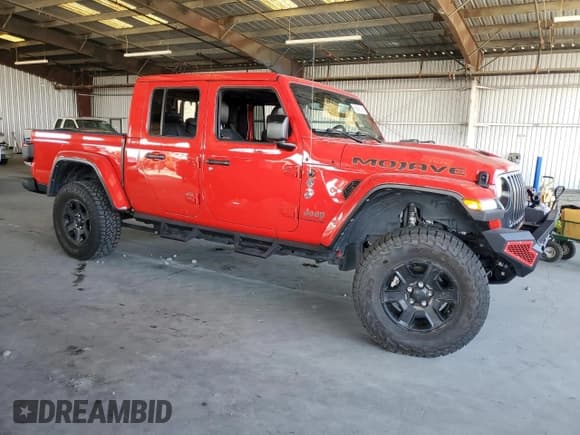 ✅ 2022 Jeep Gladiator Mojave • VIN: 1C6JJTEG9NL164076 • Lot: 69948745. Listed on Copart with 13,722 mi. Free auction sales archive from the USA and detailed vehicle history report at DreamBid. Image 4.