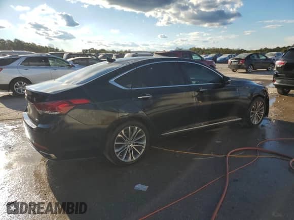 2015 Hyundai Genesis 3.8L z VIN KMHGN4JE4FU050463, wystawiony jako Copart lot #75496804 z przebiegiem 149 093 mil mil oraz Szkoda całkowita • Salvage title. Historia ofert i sprzedaży dostępna na DreamBid. Obrazek 3.