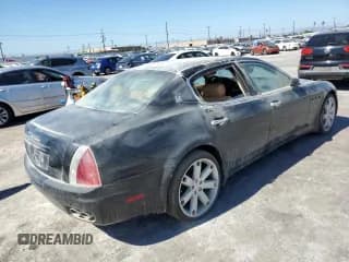 ✅ 2007 Maserati Quattroporte • VIN: ZAMFE39A870031379 • Lot: 84948165. Wystawiony na Copart z przebiegiem 58 329 mil. Bezpłatny archiwum sprzedaży aukcyjnych z USA i szczegółowy raport historii pojazdu na DreamBid. Zdjęcie 3.