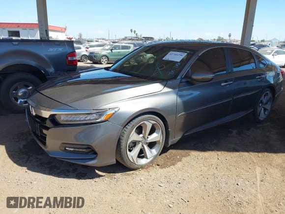 ✅ 2020 Honda Accord Touring • VIN: 1HGCV2F90LA007580 • Lot: 42760290. Listed on IAAI with 129,631 mi. Free auction sales archive from the USA and detailed vehicle history report at DreamBid. Image 2.