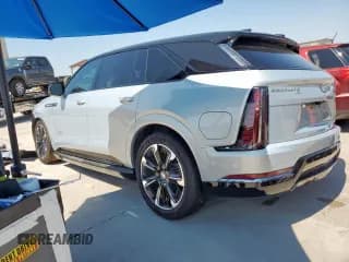 ✅ 2025 Cadillac ESCALADE IQ • VIN: 1GYTEEKL3SU101378 • Lot: 71510755. Wystawiony na Copart z przebiegiem 12 080 mil. Bezpłatny archiwum sprzedaży aukcyjnych z USA i szczegółowy raport historii pojazdu na DreamBid. Zdjęcie 2.