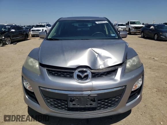 ✅ 2012 Mazda CX-7 i Touring • VIN: JM3ER2C5XC0412632 • Lot: 52569775. Wystawiony na Copart z przebiegiem 225 995 mil. Bezpłatny archiwum sprzedaży aukcyjnych z USA i szczegółowy raport historii pojazdu na DreamBid. Zdjęcie 5.