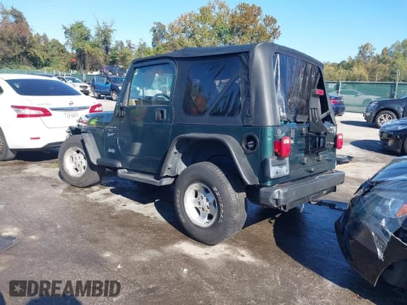 ✅ 2001 Jeep Wrangler Sport • VIN: 1J4FA49SX1P331951 • Лот: 43494613. Опубликован ранее на IAAI с пробегом 86 086 миль. Бесплатный доступ к архиву аукционных продаж из США и подробный отчёт об истории автомобиля на DreamBid. Изображение 3.