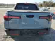 2023 Hyundai Santa Cruz SEL z VIN 5NTJCDAE7PH041270, wystawiony jako Copart lot #76526784 z przebiegiem 25 084 mil mil oraz Szkoda całkowita • Salvage title. Historia ofert i sprzedaży dostępna na DreamBid. Obrazek 6.